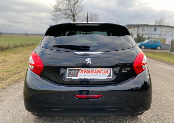 Peugeot 208 cena 26890 przebieg: 148463, rok produkcji 2014 z Strzyżów małe 781